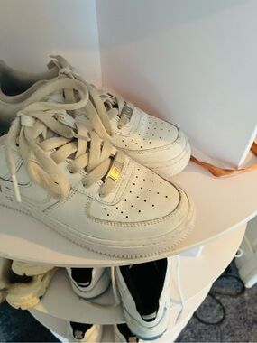 Air Force one’s White Leather Sneakers